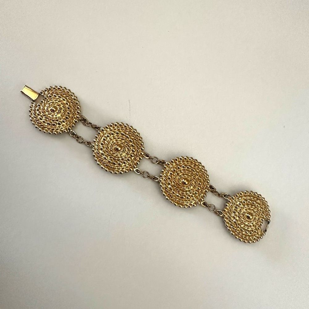 Gold tone textured circle bracelet